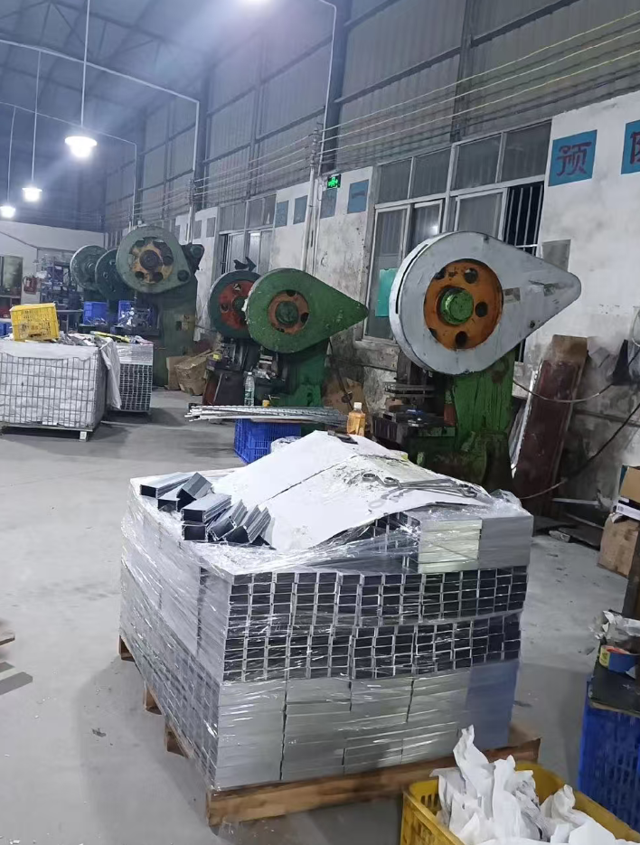 Metal stamping factory workshop with high-speed mechanical press machines